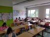 Die Teilnehmer der 3. und 4. Klassen lesen sich ein.