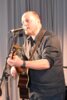 Christian Wustrau mit Gitarre