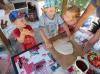 Foto vom Album: Kinder der Kita „Flämingkinder“ backen Pizza im Garten