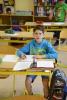 ein Sch&uuml;ler beim Schreiben