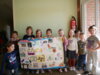 Vorschaubild der Meldung: „Kleine Hände, große Zukunft!“: Mit einem Riesenposter beteiligen sich die Dino-Gruppen am Kita-Wettbewerb